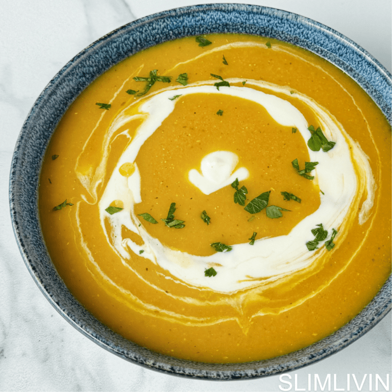 Butternut Squash and Lentil Soup in a bowl, topped with yoghurt and cilantro